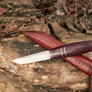 The puukko knife, m390 powder steel, micarta, leather sheath, hand made.