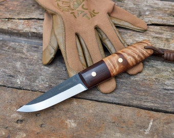 The full tang puukko knife n690 steel.