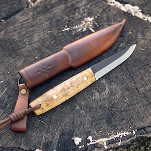The puukko knife, n690 steel, curly birch wood handle, leather sheath, full tang, hand made.