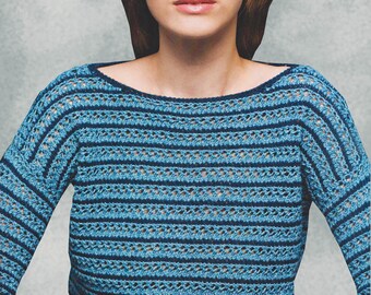 May include: A blue and navy striped crochet top with a loose fit and long sleeves. The top has a wide, open neckline.