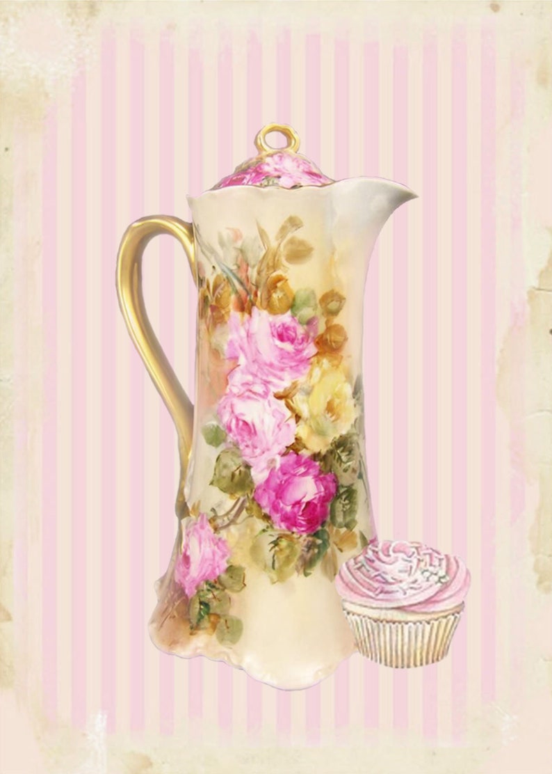 May include: A vintage porcelain teapot with a floral design and gold accents. The teapot has a lid and a handle. A pink cupcake is next to the teapot.