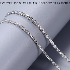 May include: Shiny sterling silver chain necklace in a braided design. The chain is available in 18, 20, 22, or 24 inches long and is 2 millimeters wide.
