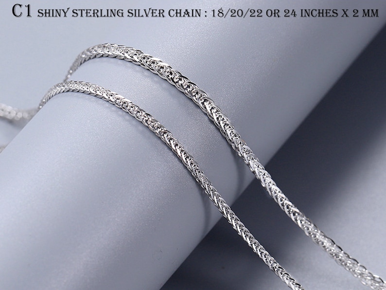 May include: Shiny sterling silver chain necklace in a braided design. The chain is available in 18, 20, 22, or 24 inches long and is 2 millimeters wide.