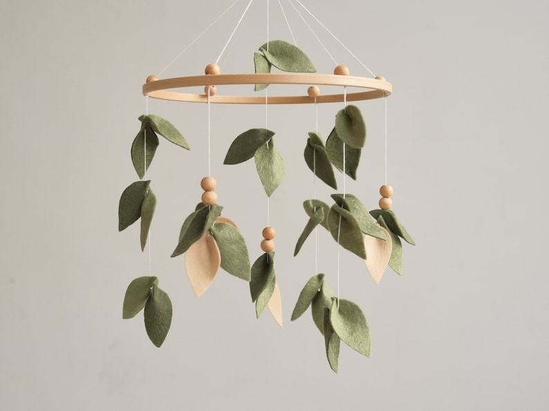 Handcrafted Forest Baby Mobile with Green and Beige Leaves and Wooden Balls - Perfect Floral Nursery Decor. Neutral Nursery Woodland Baby Mobile with Olive Leaves - Ideal Baby Shower Gift for Newborns