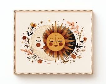 May include: A framed print depicting a sun and moon embracing, with floral and star accents. The sun is golden with a smiling face, and the moon is a light beige with a rosy cheek. The artwork has a celestial theme.