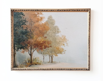 May include: An oil painting in a gold ornate frame depicts a row of trees in autumn colors. The trees transition from dark green to shades of orange and yellow, set against a soft, light blue background. The artwork evokes a serene, natural landscape.