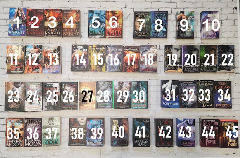 May include: A collection of 45 paperback books with numbers 1 through 45 on the spines. The books are arranged in five rows of nine books each. The books are all different colors and have different titles.