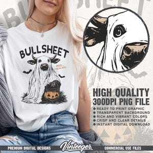 May include: White t-shirt with a Halloween-themed graphic. The design features a cow in a ghost costume holding a jack-o'-lantern, with the word "BULLSHEET" above and "MOO... MEAN BOO" below. Includes bats.