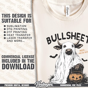 May include: Cream-colored t-shirt with a Halloween-themed graphic. The design features a cow dressed as a ghost, a jack-o'-lantern, and the word "BULLSHEET". Includes the text "MOO... I MEAN BOO". The shirt also has the text "THIS DESIGN IS SUITABLE FOR" and "COMMERCIAL LICENSE INCLUDED IN THE DOWNLOAD".
