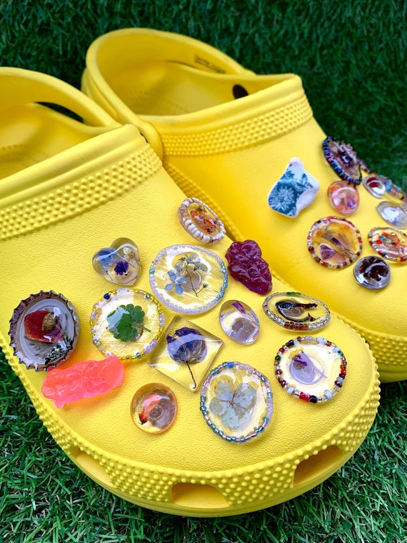 what stores sell charms for crocs