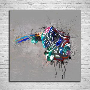 May include: Abstract art print featuring a colorful, geometric design with splashes of paint. The artwork uses a palette of blues, greens, reds, and whites against a gray background. The image is mounted on a square canvas.