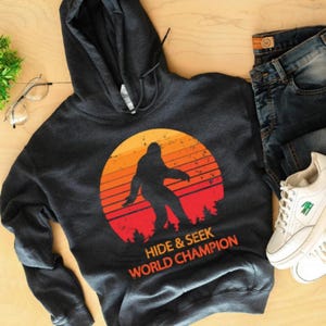 Bluza z kapturem Hide and Seek World Champion Bigfoot Big Foot Sasquatch Yeti Urban Legend Bluza z kapturem Science Hoodie dla mężczyzn i kobiet z kapturem