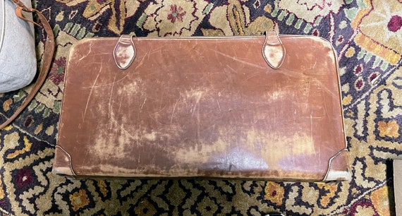 Vintage leather look suitcase with leather straps - image 1