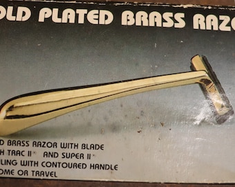 Vintage gold plated brass razor for trac 2 and super 2 with box unopened