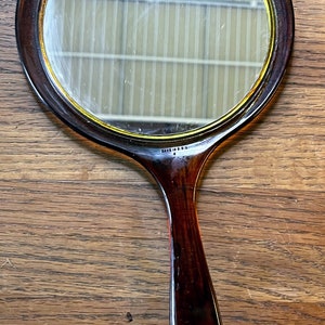 Vintage oval plastic hand mirror