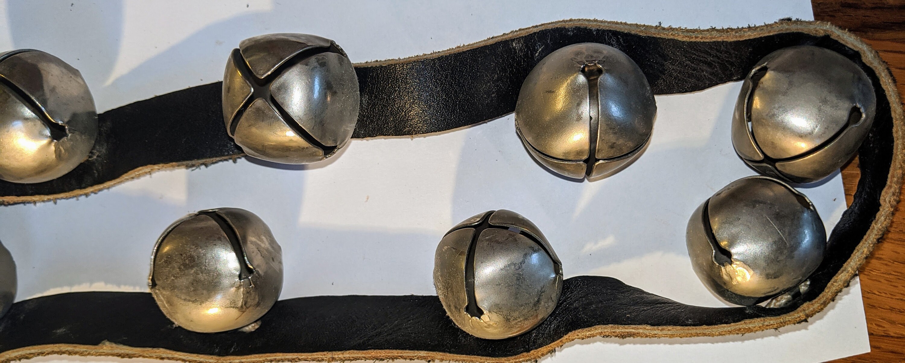 Vintage sleigh bells on leather strap