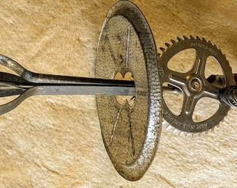 Vintage egg beater by A and J red handle