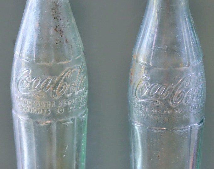 2 vintage Coke bottles 50’s and 60’s 10 oz