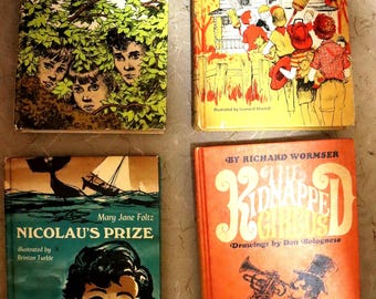 4 vintage children's books Weekly Reader book club from the 60's.