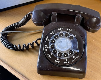 Vintage brown rotary phone.