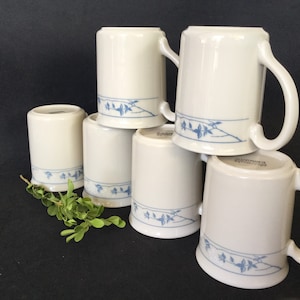 Corning/ Corelle First of Spring pattern 8 stoneware beige mugs made in Thailand