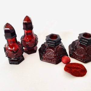 Avon 1876 Cape Cod Ruby Red Salt and Pepper Shakers and 2 Single Candle Holders