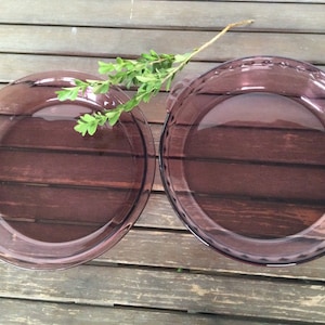Pyrex  Cranberry 2 vintage pie pans labelled 229 and 209