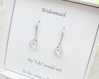 May include: A white box with a silver earring set inside. The earrings are teardrop shaped with a clear crystal in the center. The box has the text "Bridemaid" and "My "I do" would not be the same without you" printed on it.