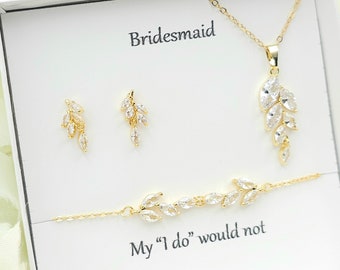 May include: A bridesmaid gift set with a necklace, earrings, and bracelet. The jewelry features a delicate design of gold leaves with clear crystals. The box includes the text "My "I do" would not be the same without you".