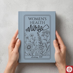 May include: A pale blue journal featuring the text "WOMEN'S HEALTH NURSE" in black script, surrounded by a floral design. The journal is held open by two hands. The text "Lindsay, RN" is at the bottom.