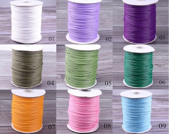 May include: Nine spools of waxed cotton cord in various colors, including white, purple, green, orange, pink, and blue. Each spool is labeled with a number from 01 to 09.