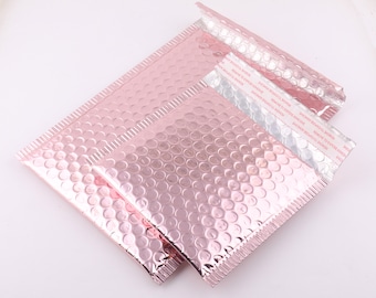 Buste imbottite rosa bianche in schiuma autoadesive, buste impermeabili, pellicola protettiva imbottita, imballaggio per la spedizione, carta per spedizioni