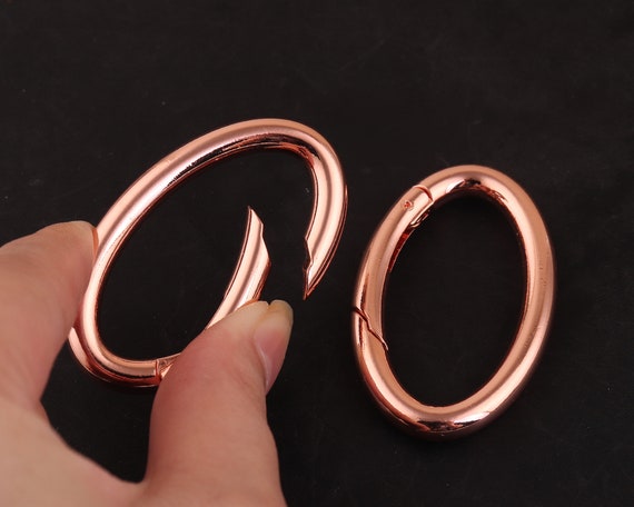Video su Qual è 20X40mm Gancio a molla girevole in metallo dorato chiaro per accessori borse