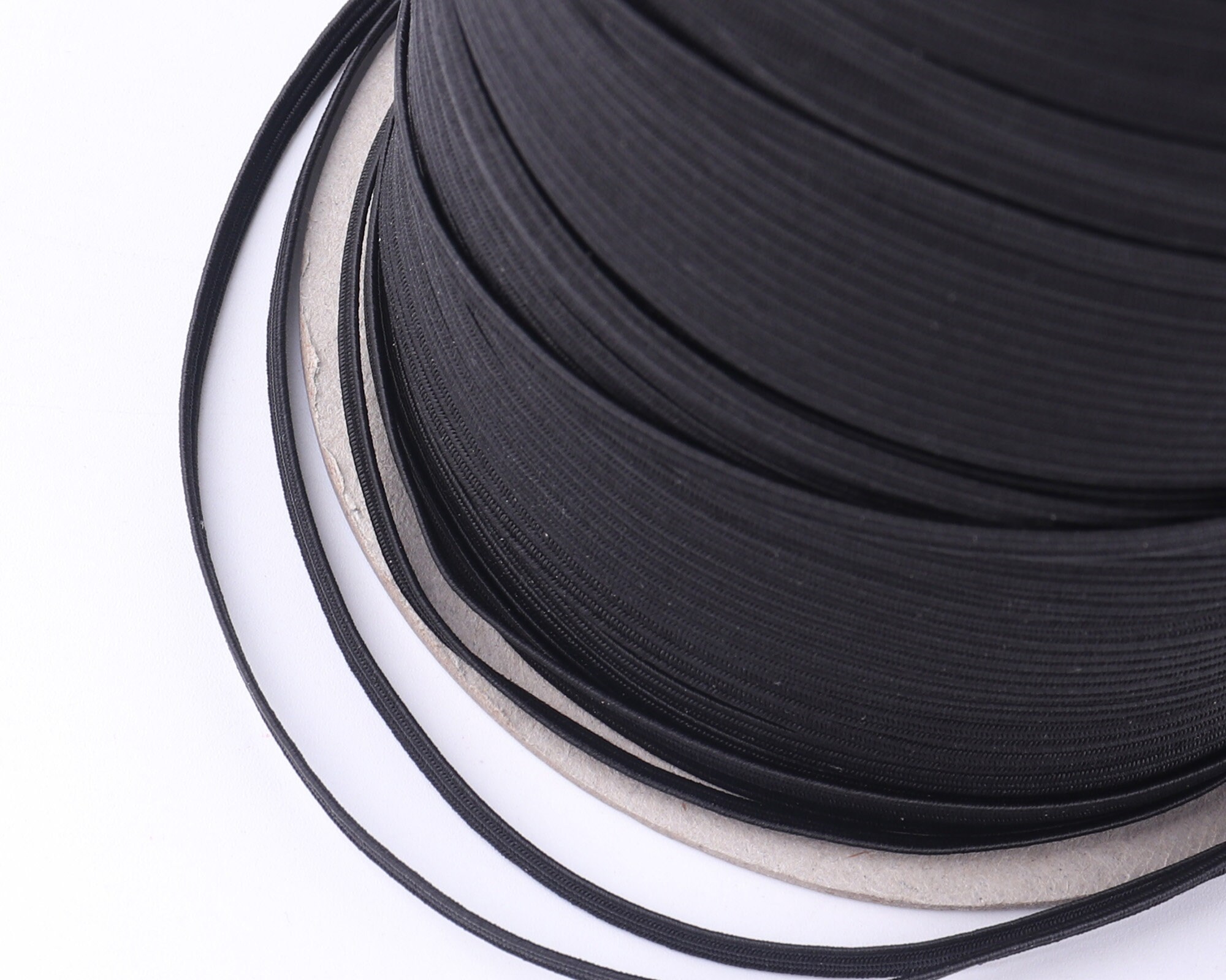 Cordón elástico de 50.3 yardas de largo, 0.472 in de ancho, cuerda  elástica, banda elástica de costura, carrete elástico de punto elástico,  rollo de