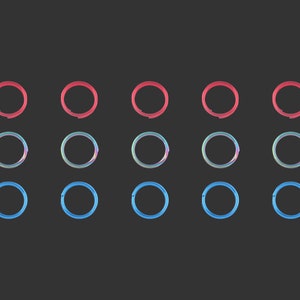May include: A set of 15 colorful metal rings, arranged in three rows of five. The top row is red, the middle row is iridescent, and the bottom row is blue.