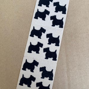 Vintage Sandylion brown back fuzzy black scottie dog sticker strip cute collectible