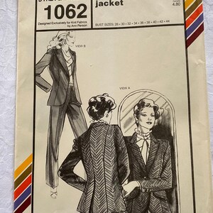 May include: A vintage sewing pattern for a fitted jacket. The pattern is for sizes 28 to 44 and is designed for knit fabrics. The pattern is called "Stretch & Sew" and the pattern number is 1062. The pattern includes two views, one with a collar and one without.