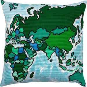 May include: A blue and green world map pillow cover. The pillow cover is made of a soft, woven fabric and features a detailed map of the world.