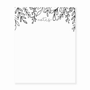 May include: A white notepad with a black floral border and the word "notes" written in gray at the top.