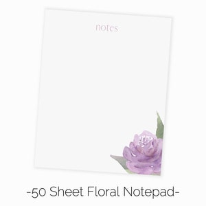 May include: A white notepad with the word "notes" printed at the top. The notepad has a purple watercolor floral design in the bottom right corner. The notepad has 50 sheets.