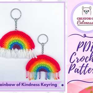 May include: Two rainbow crochet keyrings with white fringe and beads. The keyring on the left has white fringe and the keyring on the right has rainbow beads. The image includes the text "Rainbow of Kindness Keyring" and "PDF Crochet Pattern".