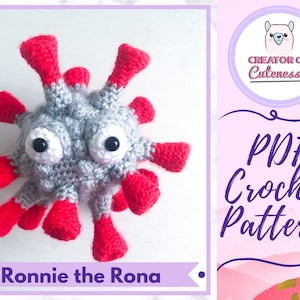 May include: A crocheted plush toy in the shape of a virus, featuring a gray body with red protrusions and large, googly eyes. The text "Ronnie the Rona" is displayed below the toy. The image also includes a "PDF Crochet Pattern" graphic.