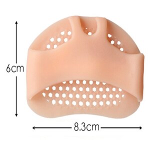 May include: A beige silicone foot pad with a honeycomb design and three toe separators. The pad measures 8.3 cm wide and 6 cm tall. The product is designed to cushion the ball of the foot.
