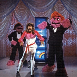 DOUG HENNING PERFORMATION I Mupparna (1980) / Magikerns fotoåtertryck