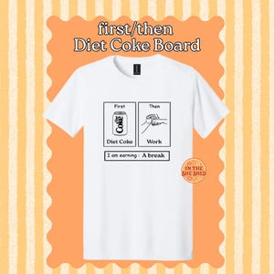 May include: A white short-sleeve t-shirt featuring a black graphic print. The design includes two boxes labeled First and Then, showing a Diet Coke can and a hand gesture for work, with the text I am earning : A break printed below.