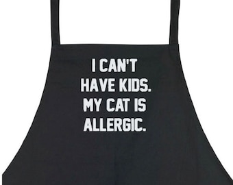 I Can't Have Kids My Cat Is Allergic - Embroidered Apron Black. Made By EmbroiderableLinens Inc. Embroidered In Your Choice Of Color!