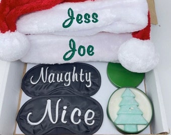 Personalized Christmas Box Gift Set, Includes 2 Embroidered Santa hats- 1 Naughty, 1 Nice Sleep Eye Cover and 1 Soy Wax Handmade Candle.