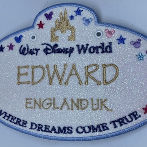 Etiqueta para cochecito de bebé bordada personalizada de Walt Disney World con forma de miembro del elenco *Vendedor del Reino Unido*