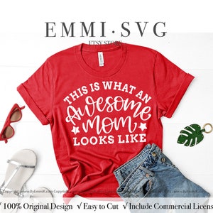 May include: A digital download of a black and white SVG file with the text "This is what an awesome mom looks like" in a handwritten font. The text is in a semi-circle shape with a star on either side of the word "mom".