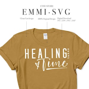 May include: A digital download of a graphic design featuring the text "Healing takes time" with a heart symbol. The design is in white text on a mustard yellow t-shirt.